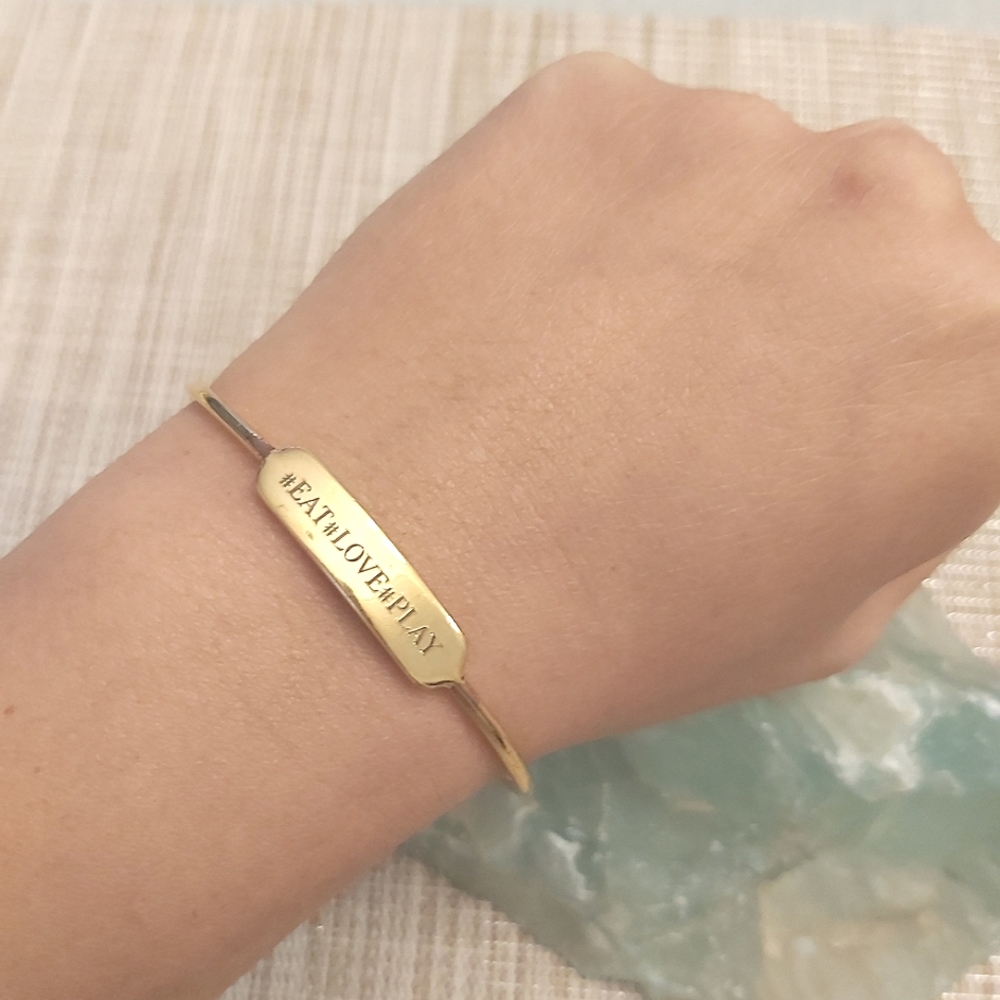 Stella & Dot goldtone eat love play cuff bracelet